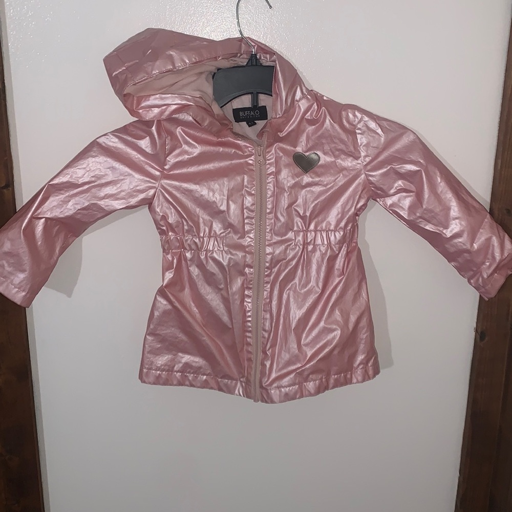 Darling little girl rain coat pink with a little heart size 4t